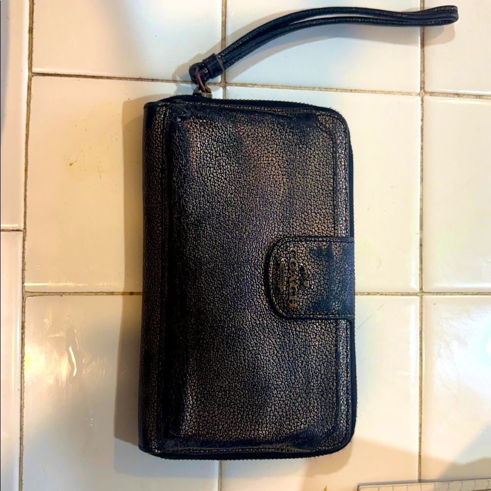 Coach Wristlet. Metallic in color.